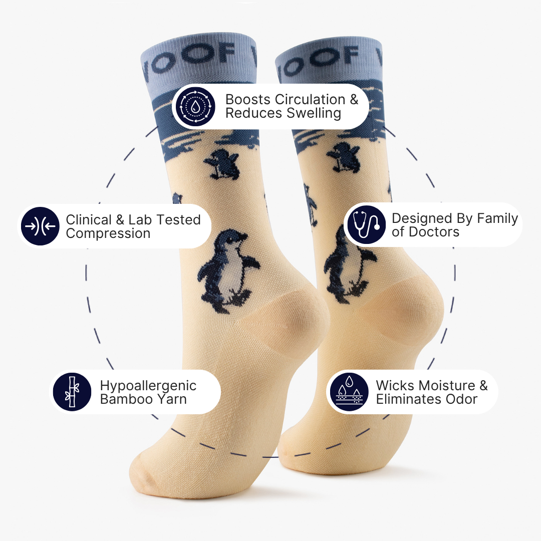 Infographic highlighting key features around cream bamboo crew compression socks with penguin design.